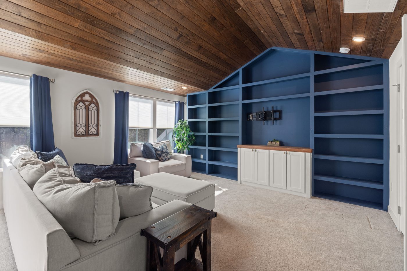 Bright finished interior addition with custom built-in shelving